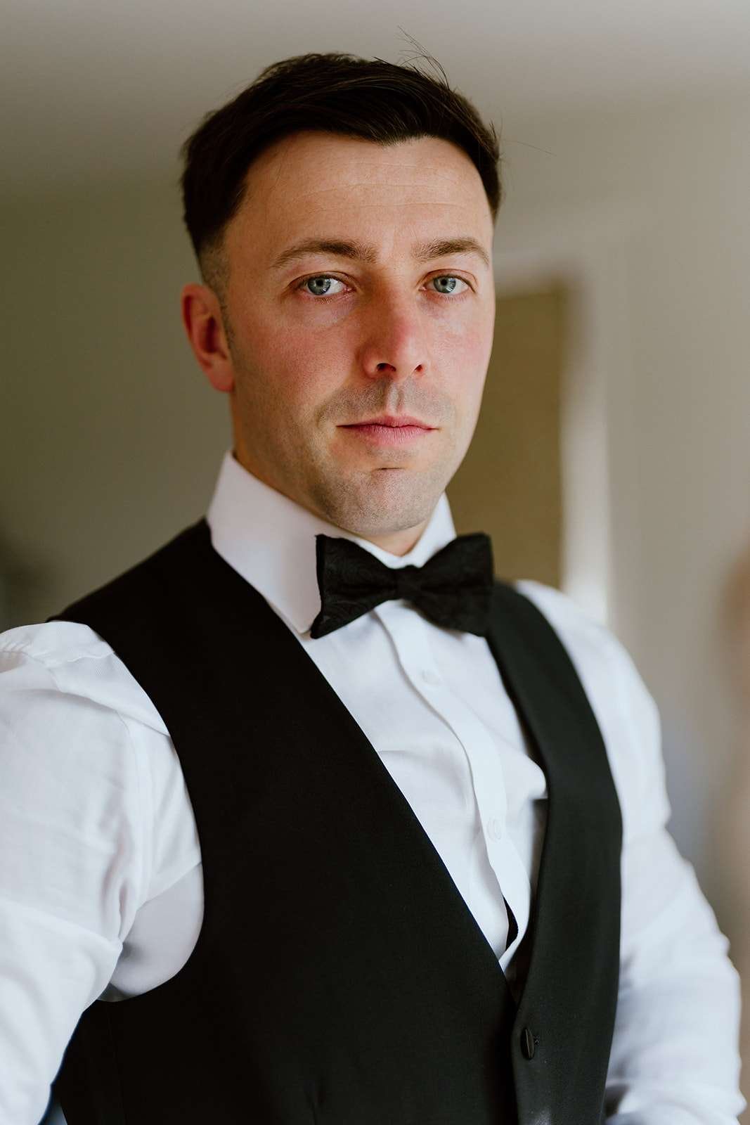 groom getting ready at antrobus house 