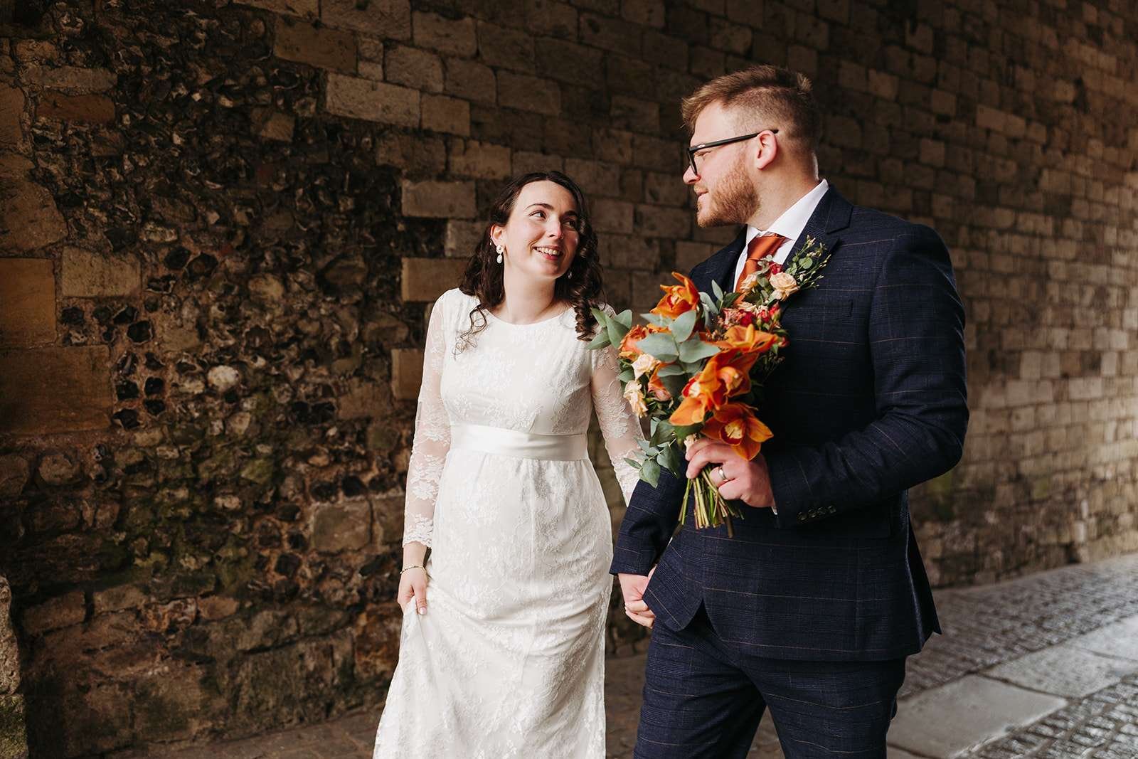 Bride and groom photoshoot outside Winchester Registry Office at Westgate photo by Winchester wedding photographer