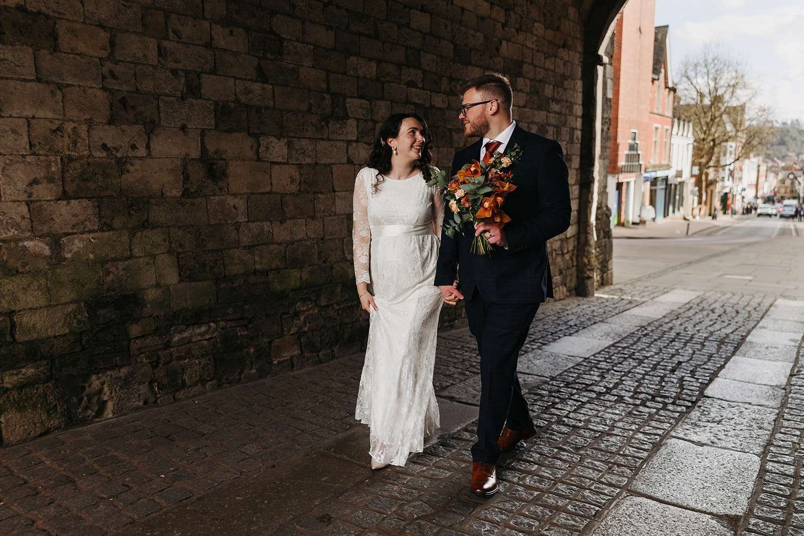 Bride and groom photoshoot outside Winchester Registry Office at Westgate photo by Winchester wedding photographer