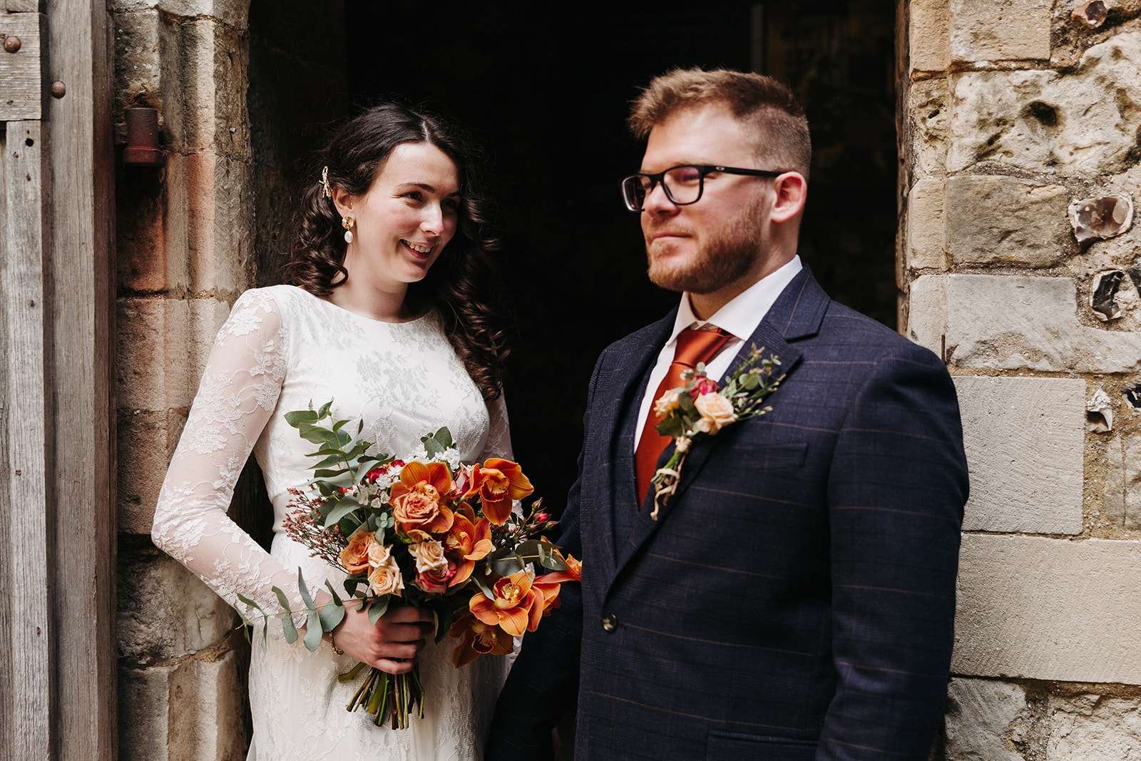 Bride and groom first look photoshoot outside Winchester Registry Office photo by Winchester wedding photographer