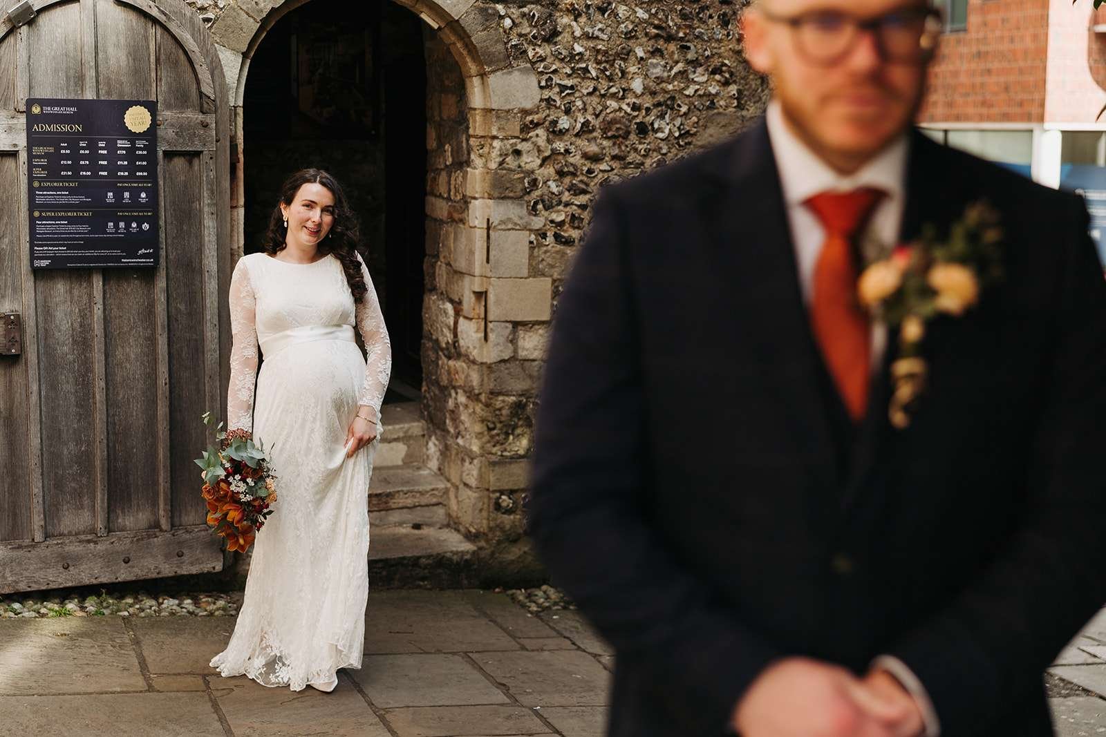 Bride and groom first look photoshoot outside Winchester Registry Office photo by Winchester wedding photographer
