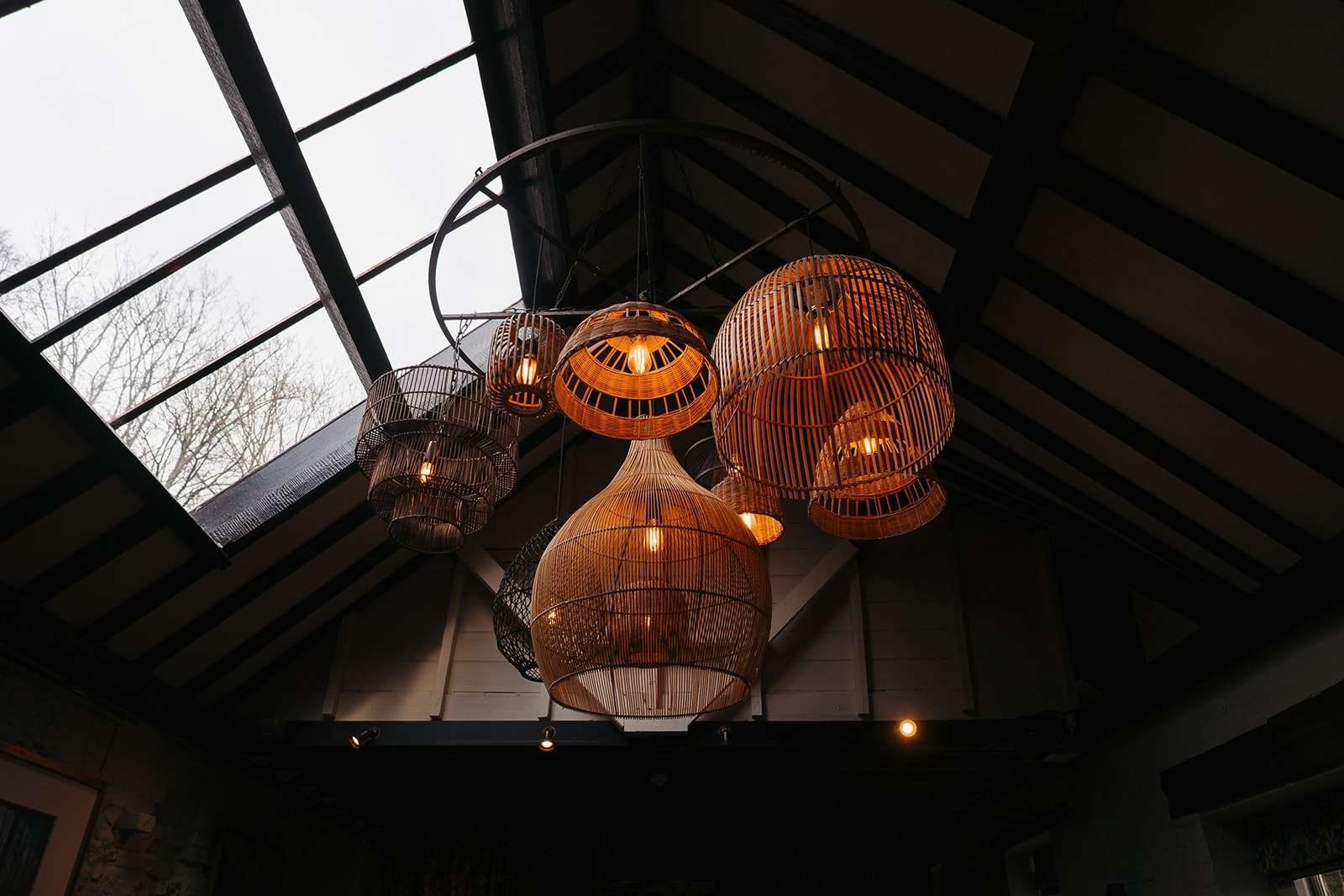 Rustic wedding lights inside The Cart & Horses, captured by a Winchester wedding photographer.