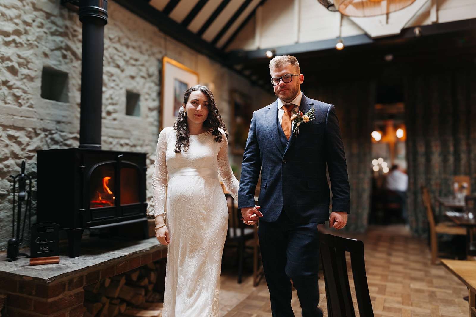 Bride and groom at The Cart & Horses rustic reception venue.