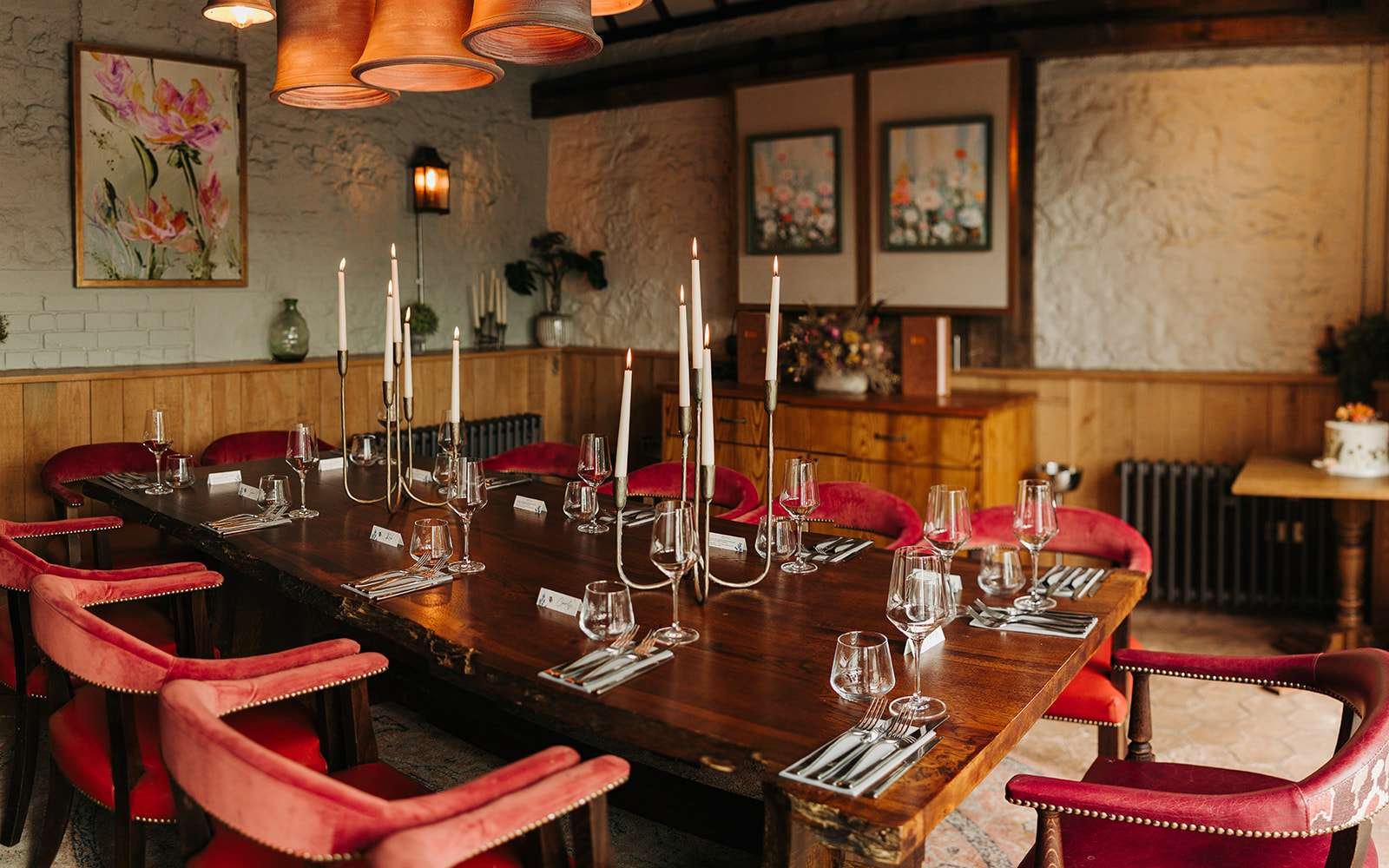 Rustic wedding reception setup inside The Cart & Horses, captured by a Winchester wedding photographer.