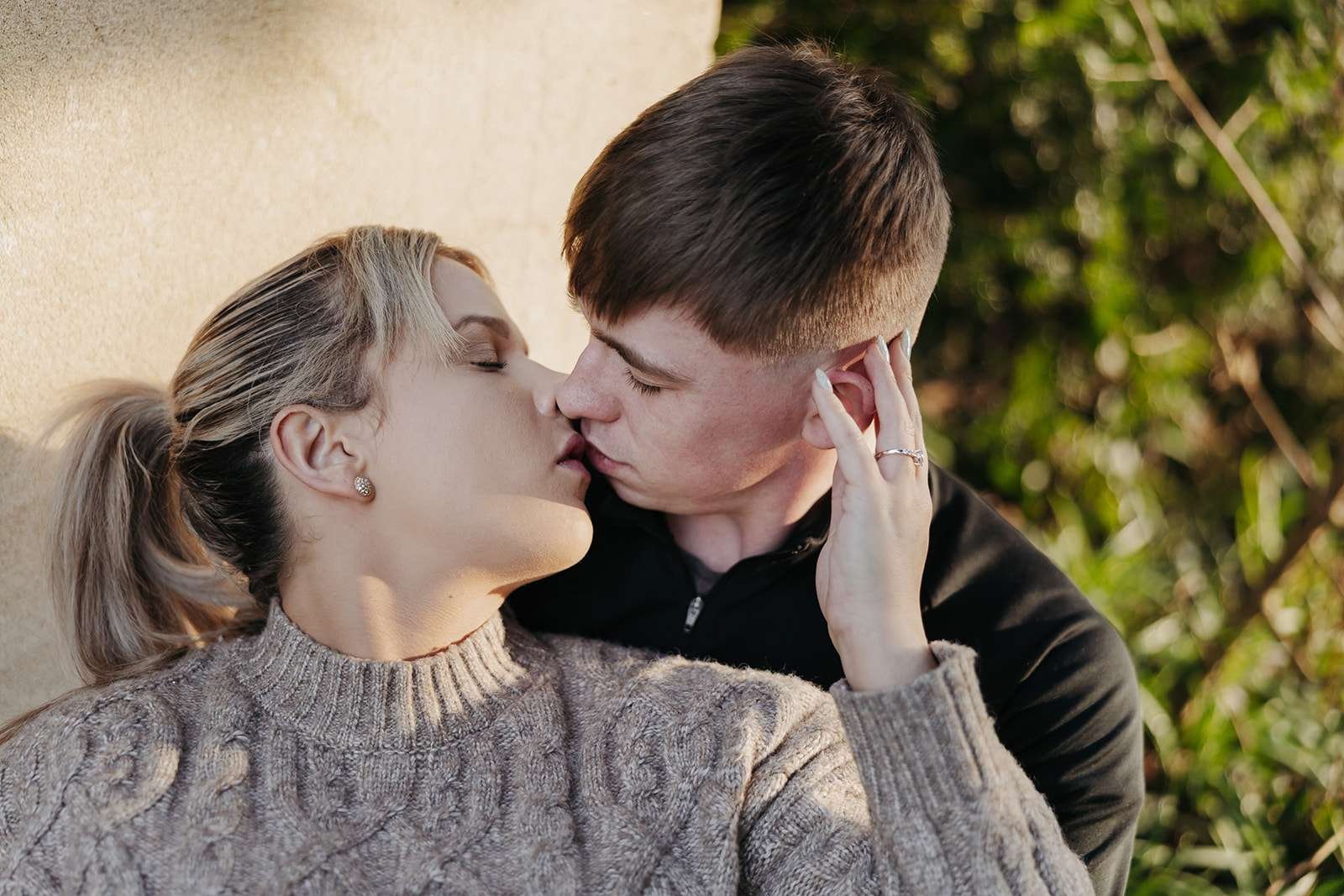 Dreamy engagement session with golden hour light illuminating a couple’s love