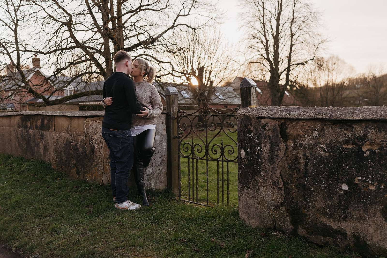 A couple enjoying a fun and lighthearted engagement shoot in Salisbury.