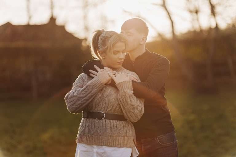 Golden hour couple session in Wiltshire, with a breathtaking sunset behind them.